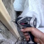 Fastening a wooden block to a dowel in concrete