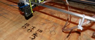 Homemade laser machine in the process of wood engraving